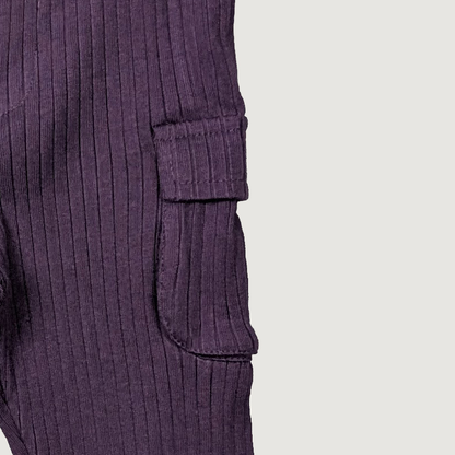 Close-up of a ribbed purple sweater with two front pockets organic cotton