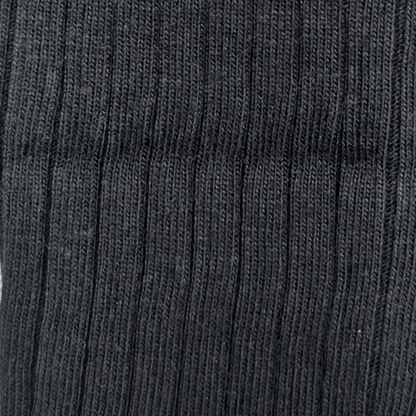 Close-up of a textured ribbed black fabric organic cotton
